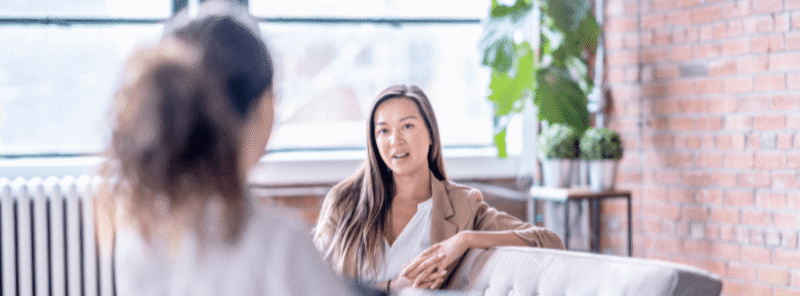 woman speaking in therapy session